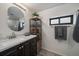 Stylish bathroom featuring modern fixtures, a sleek vanity, and ample storage space for everyday essentials at 1050 N Corona St # 202, Denver, CO 80218