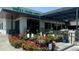 Exterior view of Whole Foods Market with flowers and landscaping in front of the entrance at 1050 N Corona St # 202, Denver, CO 80218