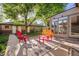 Inviting backyard patio with colorful seating, ideal for outdoor entertaining at 2633 Quitman St, Denver, CO 80212