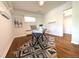 Comfortable bedroom featuring hardwood floors, a cozy rug, and ample natural light at 2633 Quitman St, Denver, CO 80212