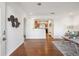 Bright living room showcasing hardwood floors, neutral paint, and an open floor plan for flexible living at 2633 Quitman St, Denver, CO 80212