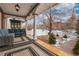 Relaxing front porch featuring outdoor seating and a view of the landscaped yard at 1614 Gaylord St, Denver, CO 80206