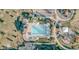 An aerial view of a community pool, amenities, and a playground with many seats at 20727 Park Hollow Dr, Parker, CO 80138