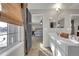 Bathroom with double vanity and access to the main bedroom at 20727 Park Hollow Dr, Parker, CO 80138