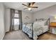 Charming bedroom with a metal bed frame and window seating at 20727 Park Hollow Dr, Parker, CO 80138