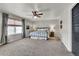 Bright bedroom with carpeted floors and ceiling fan at 20727 Park Hollow Dr, Parker, CO 80138