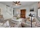 Cozy living room with plush sofas, a fireplace, and a staircase leading to the upper level at 20727 Park Hollow Dr, Parker, CO 80138