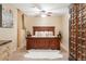 Spacious bedroom featuring a large bed, ceiling fan, and neutral-toned walls at 155 S Poplar St, Denver, CO 80230
