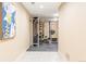 Home gym featuring rubber mat floors, a weight machine, and neutral walls at 155 S Poplar St, Denver, CO 80230