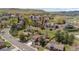 Charming aerial view of the neighborhood featuring lush landscaping, mature trees and green lawns at 14533 W 3Rd Ave, Golden, CO 80401