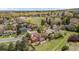 Lovely aerial view of neighborhood featuring manicured lawn, patio, mature trees and established landscaping at 14533 W 3Rd Ave, Golden, CO 80401