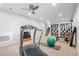 Finished basement including a treadmill, exercise ball, and carpeted floor at 14533 W 3Rd Ave, Golden, CO 80401