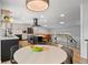 Spacious kitchen with island seating, modern appliances, and eat in dining area at 14533 W 3Rd Ave, Golden, CO 80401