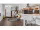 Living space with desk, stairs and kitchen view at 14533 W 3Rd Ave, Golden, CO 80401