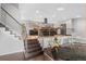 Open floor plan with living area, kitchen, and desk space at 14533 W 3Rd Ave, Golden, CO 80401