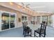 Cozy sunroom featuring brick accent walls, skylights, and comfortable seating at 14533 W 3Rd Ave, Golden, CO 80401