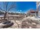 Extensive backyard features a fire pit, patio, and inviting outdoor space at 4688 Cedar Glen Pl, Castle Rock, CO 80109