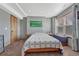 Cozy bedroom with natural light and storage chest at the foot of the bed at 4688 Cedar Glen Pl, Castle Rock, CO 80109