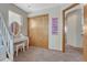 Bedroom with vanity, neutral carpet, and a walk-in closet is well lit at 4688 Cedar Glen Pl, Castle Rock, CO 80109