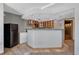 Stylish kitchenette with blue accent lights, sleek cabinets, and modern appliances at 4688 Cedar Glen Pl, Castle Rock, CO 80109