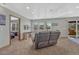 Comfortable living room with plush seating and a view to an adjacent room at 4688 Cedar Glen Pl, Castle Rock, CO 80109