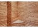 Cedar sauna showcasing natural wood walls and built-in bench for relaxation at 4688 Cedar Glen Pl, Castle Rock, CO 80109