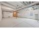 Unfinished basement space with exposed duct work, concrete floors, and framed construction at 21091 E 63Rd Dr, Aurora, CO 80019
