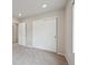 This is a carpeted bedroom with neutral walls, closets, recessed lights, and a window at 21091 E 63Rd Dr, Aurora, CO 80019