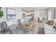 Open-concept living area showcasing modern decor and a bright, airy atmosphere at 21091 E 63Rd Dr, Aurora, CO 80019
