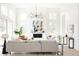 Elegant living room with high ceilings, fireplace, and modern decor creating a comfortable atmosphere at 3022 Fenton St, Wheat Ridge, CO 80214