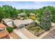 Charming single-story home with beautiful landscaping, mature trees, and a spacious driveway at 6811 S Clermont Dr, Centennial, CO 80122