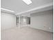 Large basement area featuring neutral carpet, utility hookups, and potential for customization at 6811 S Clermont Dr, Centennial, CO 80122