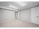 This finished basement space has carpet and two doors at 6811 S Clermont Dr, Centennial, CO 80122