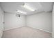 This finished basement space has carpet and one small window at 6811 S Clermont Dr, Centennial, CO 80122