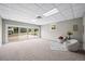 Finished basement with large sliding glass doors that provide tons of natural light at 6811 S Clermont Dr, Centennial, CO 80122