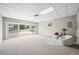 Finished basement with large sliding glass doors that provide tons of natural light at 6811 S Clermont Dr, Centennial, CO 80122