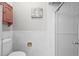 This bathroom has marble wall tiles and a glass door shower at 6811 S Clermont Dr, Centennial, CO 80122