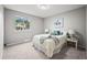 This bedroom has carpet, a large window, and is well decorated at 6811 S Clermont Dr, Centennial, CO 80122