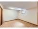 Unfurnished bedroom with closet and window, ready for personalization at 10365 E Weaver Cir, Englewood, CO 80111