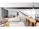 Basement featuring modern finishes, staircase, and wet bar at 1880 S Adams St, Denver, CO 80210