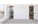 Bright bedroom showing entrances to the bathroom and hallway at 1880 S Adams St, Denver, CO 80210