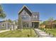 Beautiful two-story home with landscaped yard and modern design at 1880 S Adams St, Denver, CO 80210