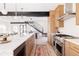 Spacious kitchen with a large center island and stainless steel appliances at 1880 S Adams St, Denver, CO 80210