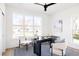 Bright home office with a modern desk, comfortable seating and a large window at 1880 S Adams St, Denver, CO 80210