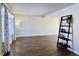 Spacious living room with hardwood floors and large windows at 13030 E Kansas Pl, Aurora, CO 80012