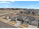 The beautiful neighborhood is captured by an aerial view showcasing well-maintained lawns and tree-lined streets at 12938 Bridge View Ln, Parker, CO 80134