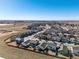 A beautiful aerial view shows neighborhood homes and community layout within the landscape at 2303 Angus St, Mead, CO 80542