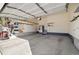 Spacious garage with ample storage, tool organization, and a convenient entrance to the home at 2303 Angus St, Mead, CO 80542