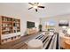 Stylish living room showcasing modern decor, a cozy seating area, and ample natural light at 2303 Angus St, Mead, CO 80542