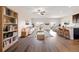 Inviting living room featuring modern furnishings, light-filled windows, and seamless open-concept design at 2303 Angus St, Mead, CO 80542